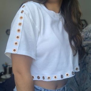 White crop top with grommet detail